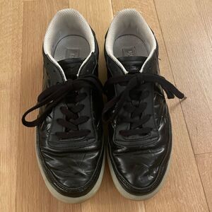 Black shiny Reebok sneakers
